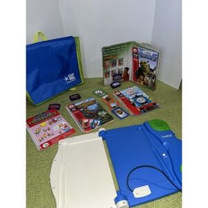 LeapFrog School House Leap Pad System  Lot 4 Books  & 4 cartridges backpack